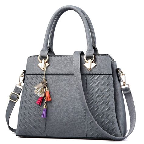 latest hand bags for ladies|a fancy handbags for ladies.